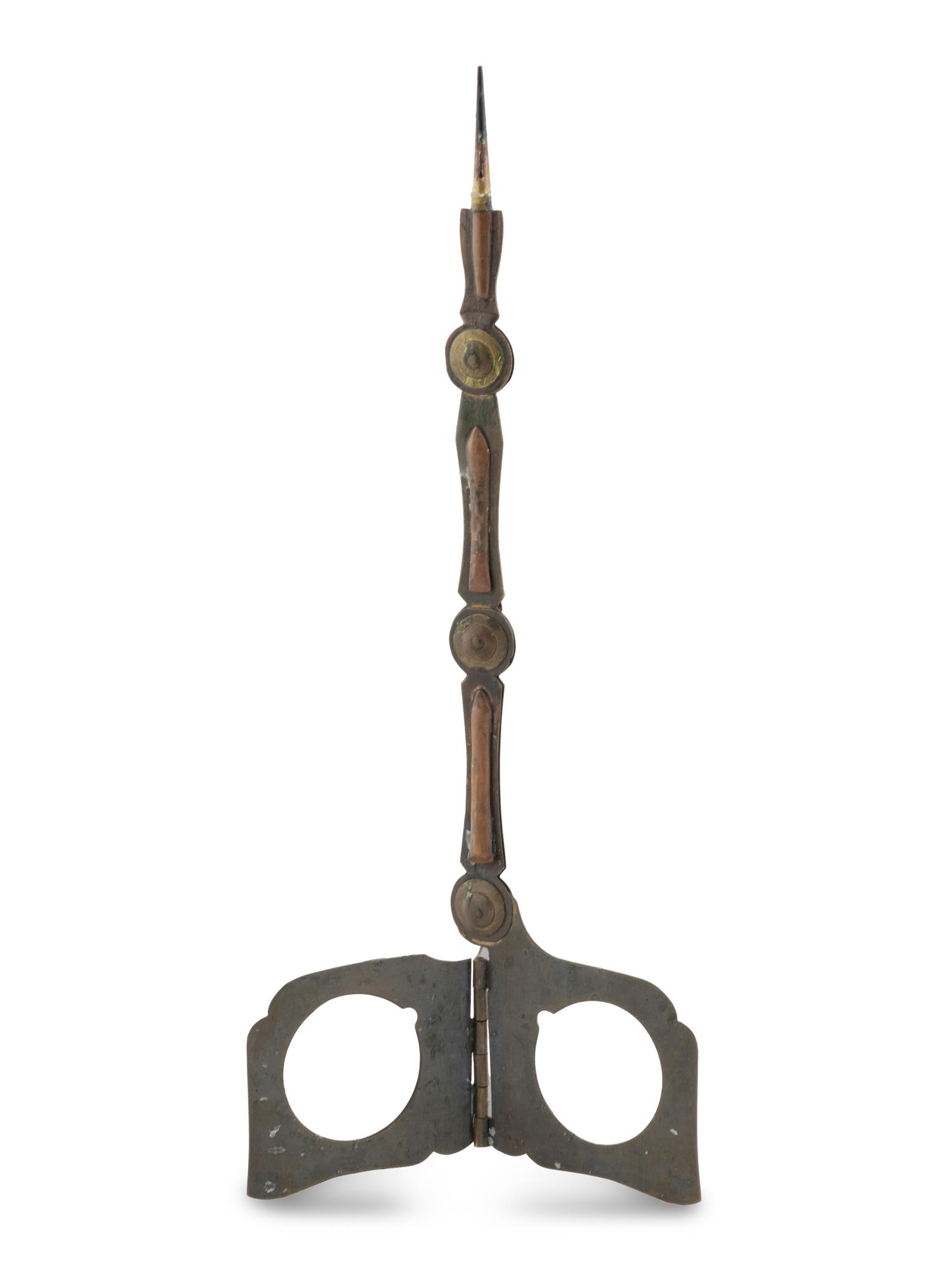 A Bradley and Hubbard Metal Candlestick