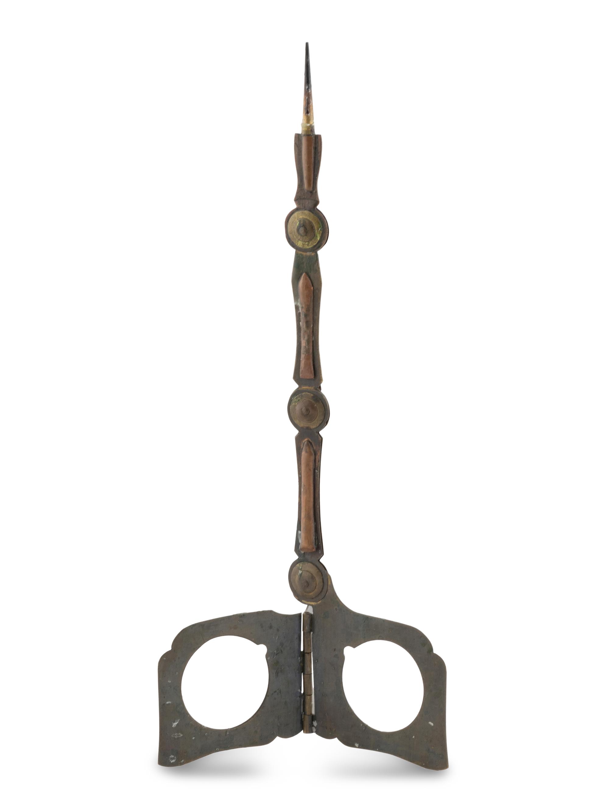 A Bradley and Hubbard Metal Candlestick