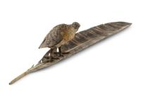 An Austrian Cold-Painted Bronze Figure of a Bird of Prey Perched on a Feather