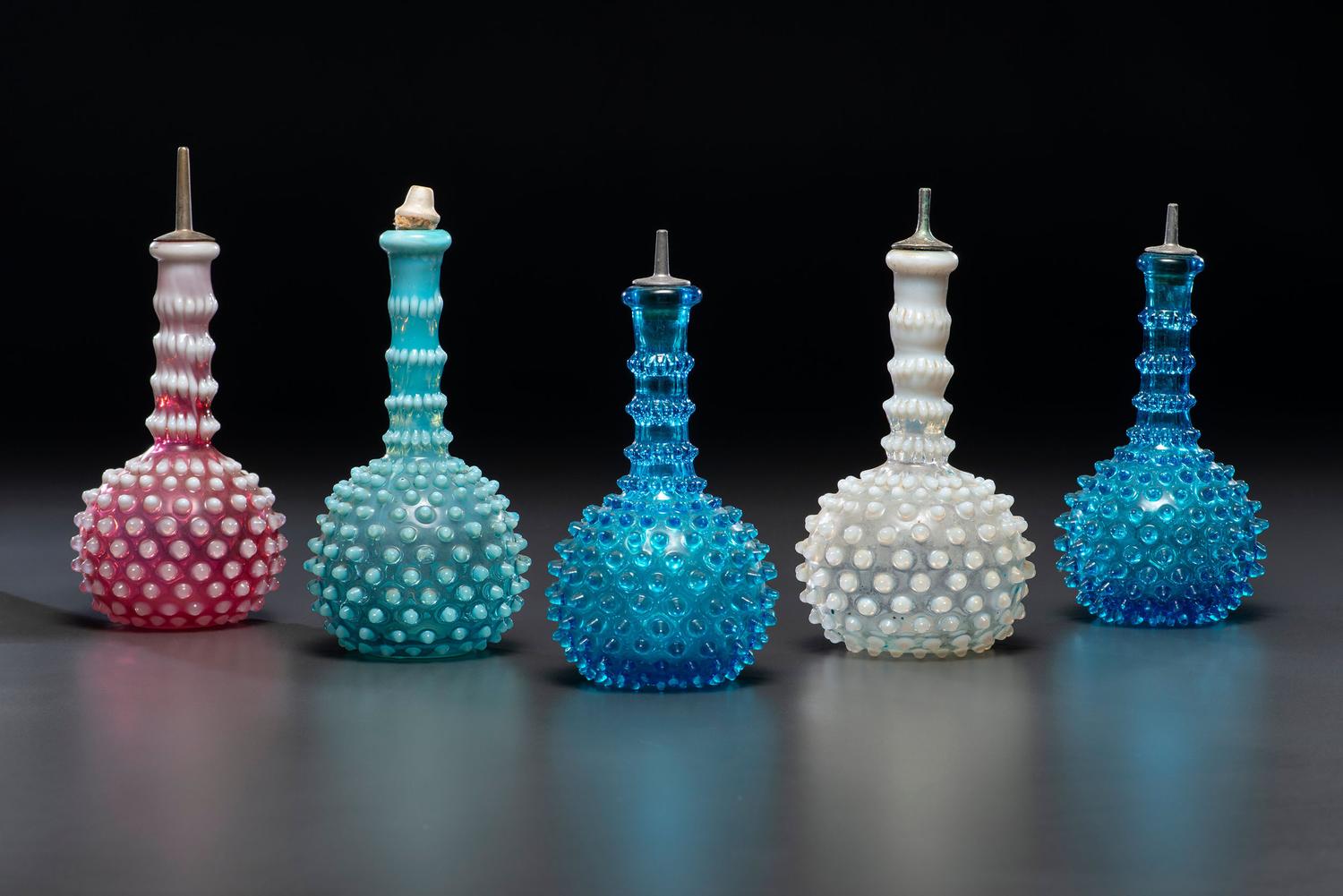 Five Hobnail Glass Barber Bottles