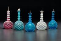 Five Hobnail Glass Barber Bottles