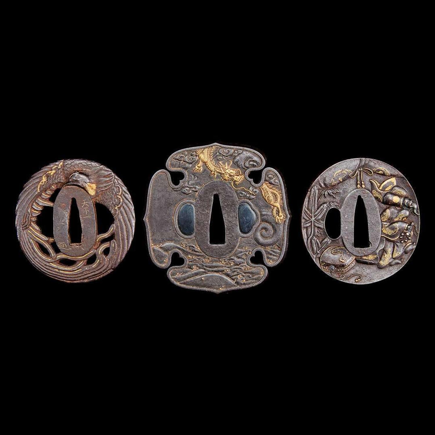 A group of three Japanese gold-inlaid iron tsuba, one signed 日本嵌金刀镡一组三件 一件带签字 Edo to early Meiji period ?????