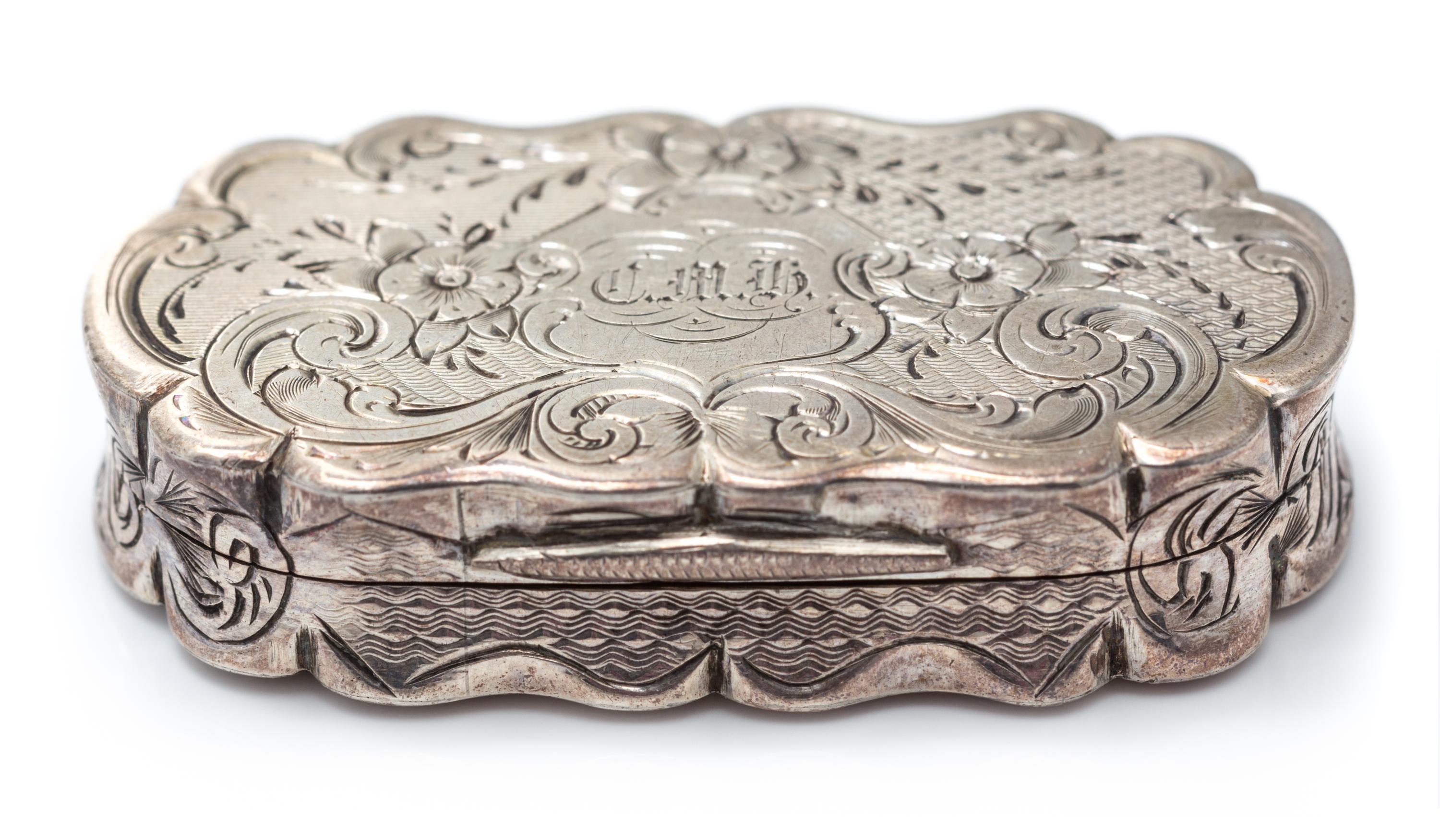A Victorian Silver Vinaigrette, Frederick Marson, Birmingham, 1869, of oval form with floral and foliate decoration.