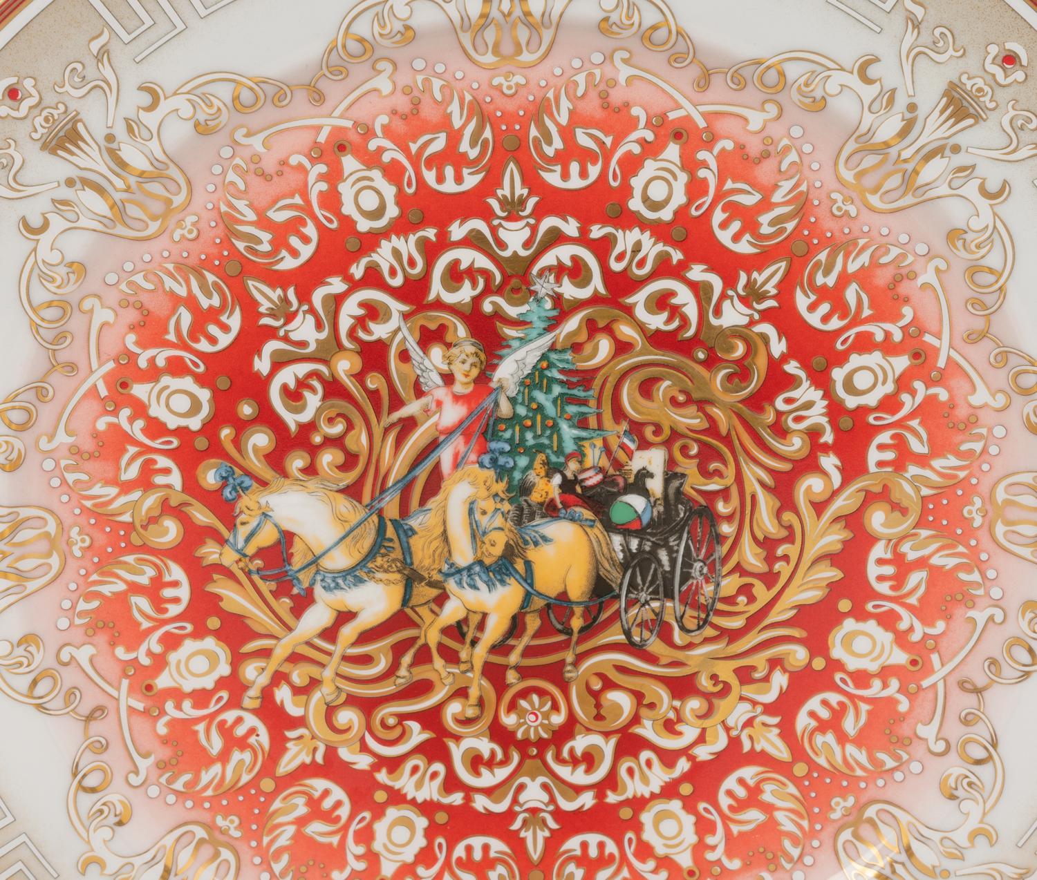 A Group of Versace Christmas Chariot Porcelain Table Articles