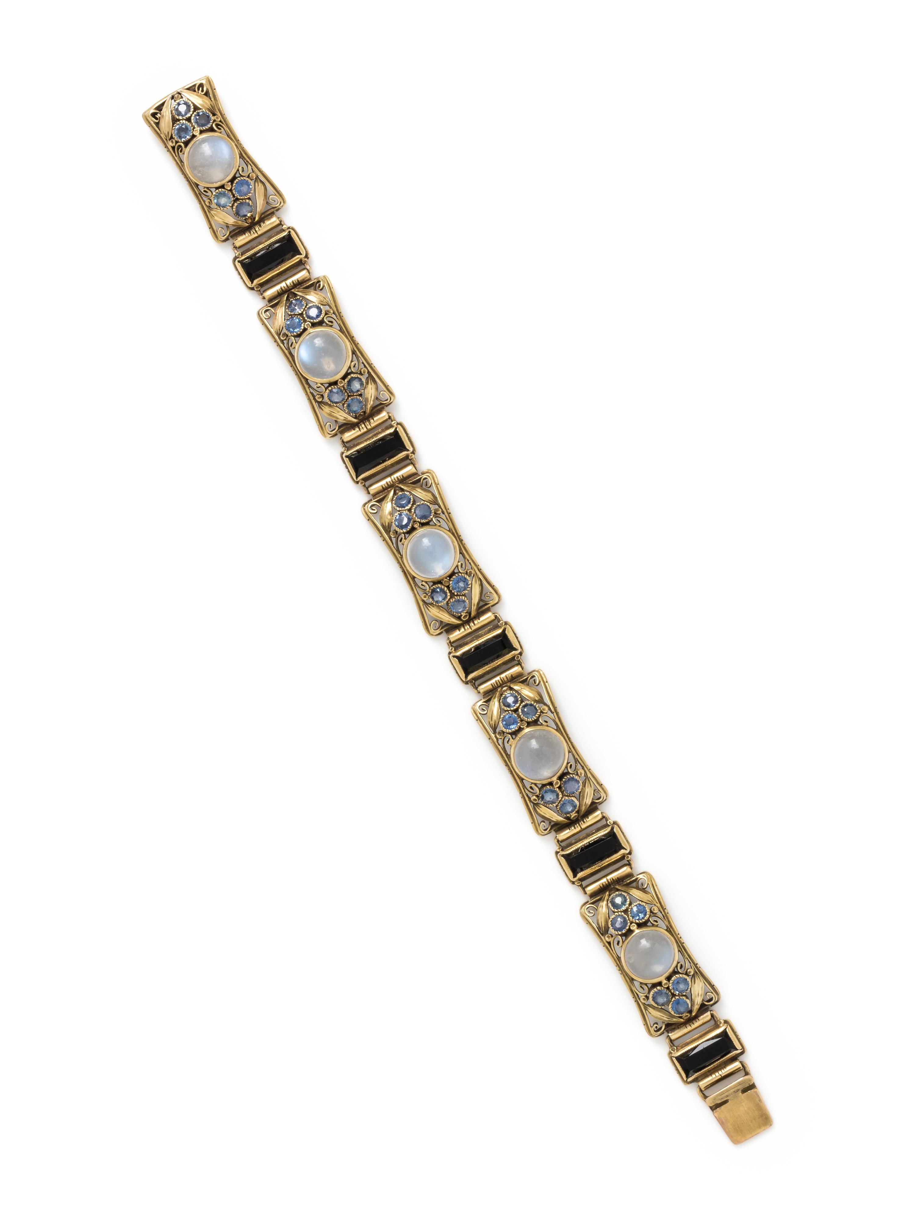 ARTS & CRAFTS, YELLOW GOLD, MOONSTONE, SAPPHIRE AND ONYX BRACELET