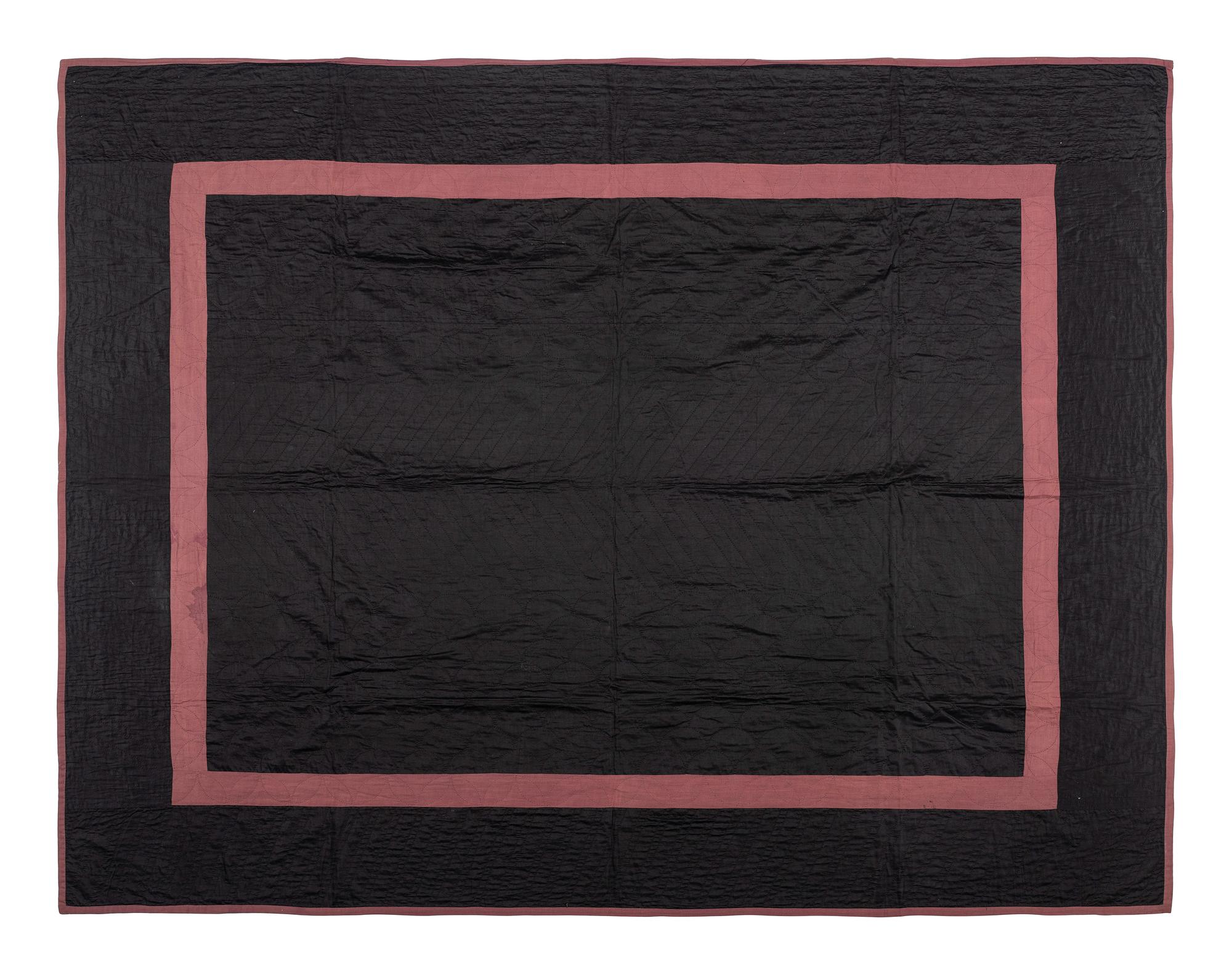 An Amish Pieced Cotton Quilt