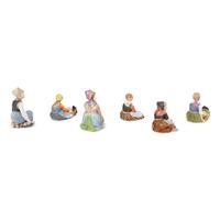A Group of Six Royal Copenhagen Children of the Provinces Porcelain Figures