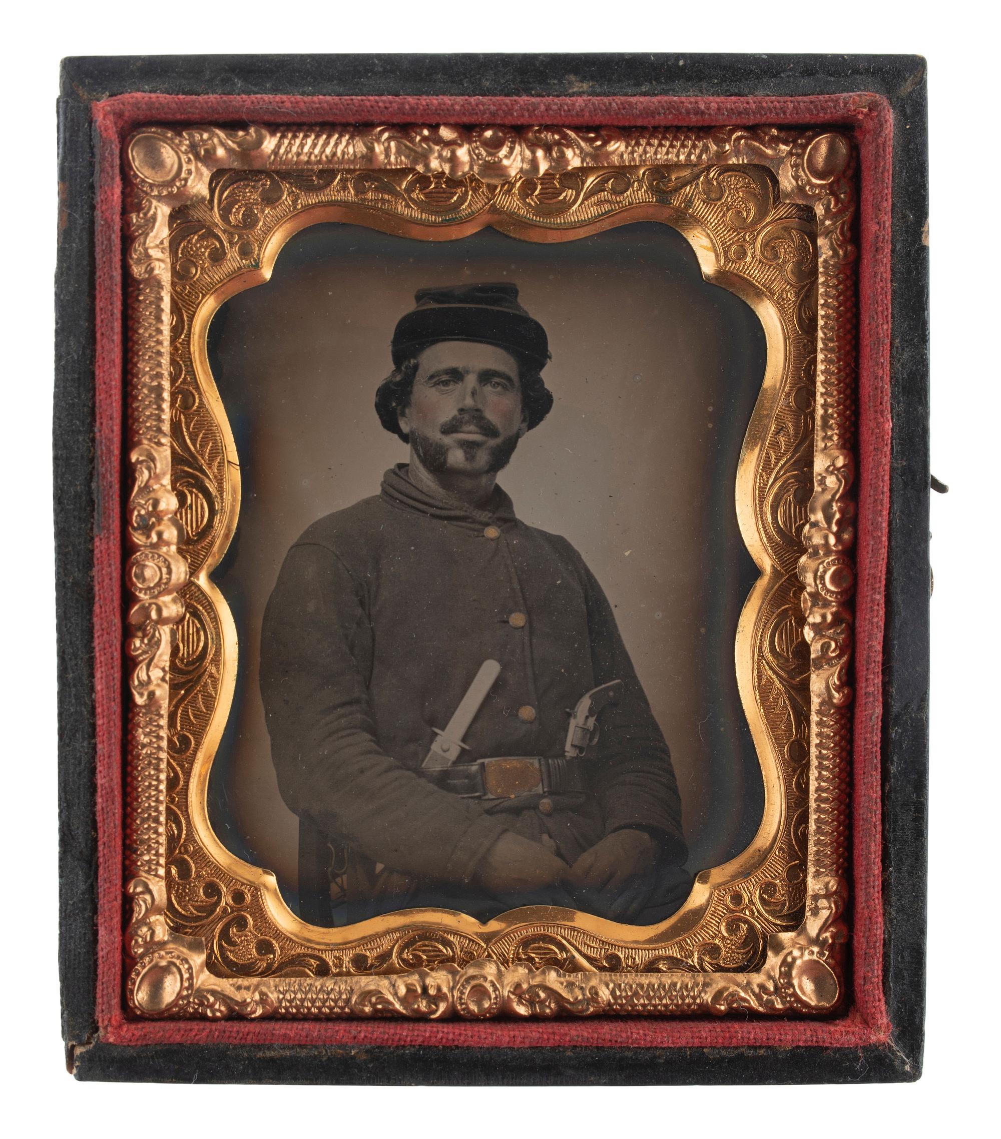 [CIVIL WAR]. Ninth plate tintype portrait of a doubly armed federal soldier.