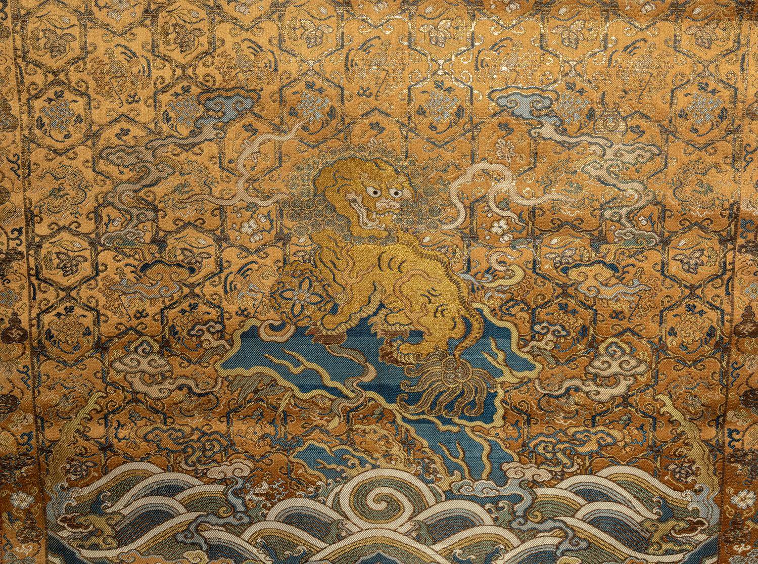A Chinese Gold Ground Brocade Woven Silk Panel