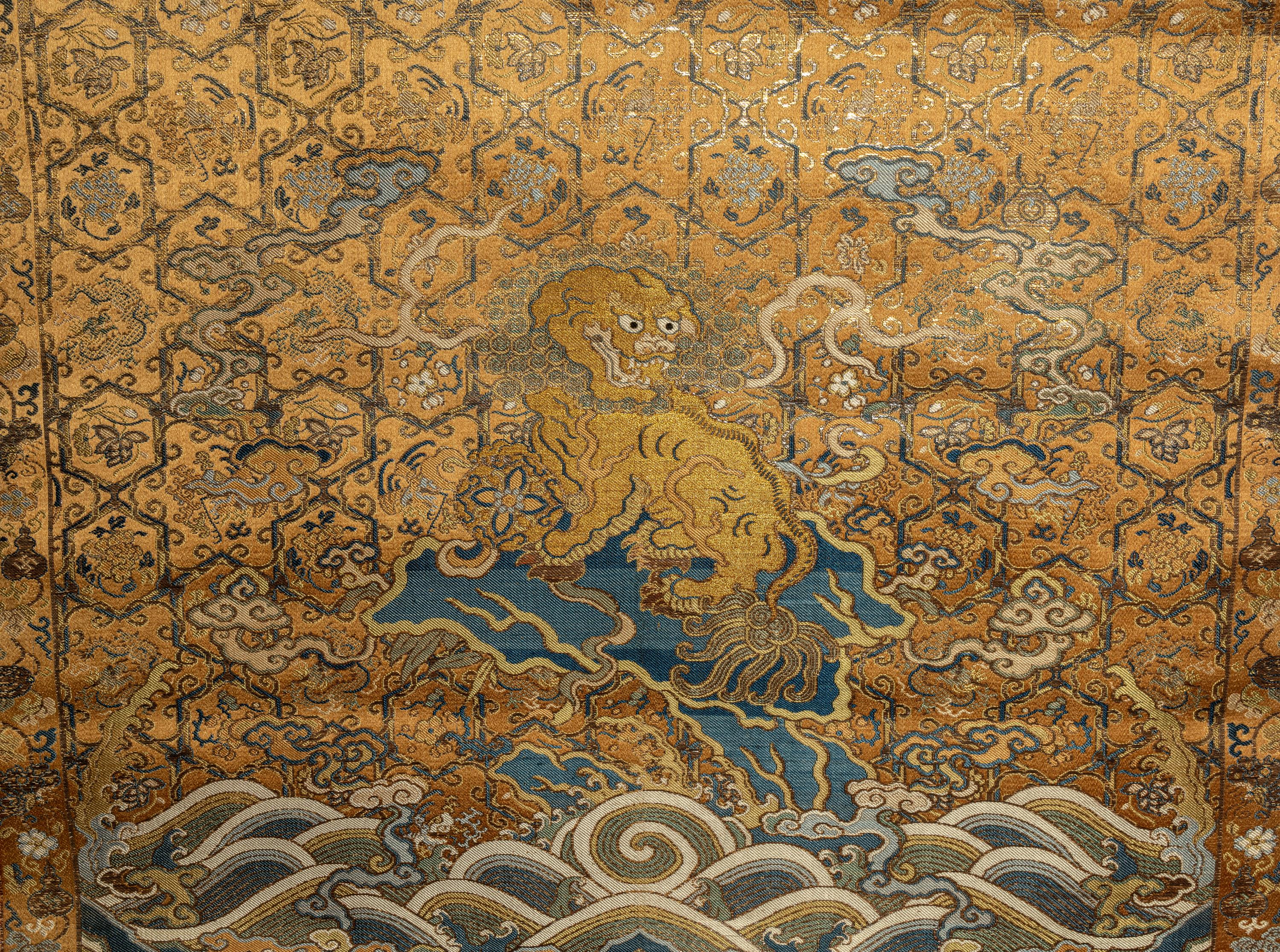 A Chinese Gold Ground Brocade Woven Silk Panel