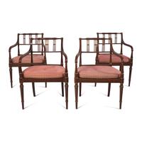 A Set of Four Regency Style Paint-Decorated Fruitwood Open Armchairs