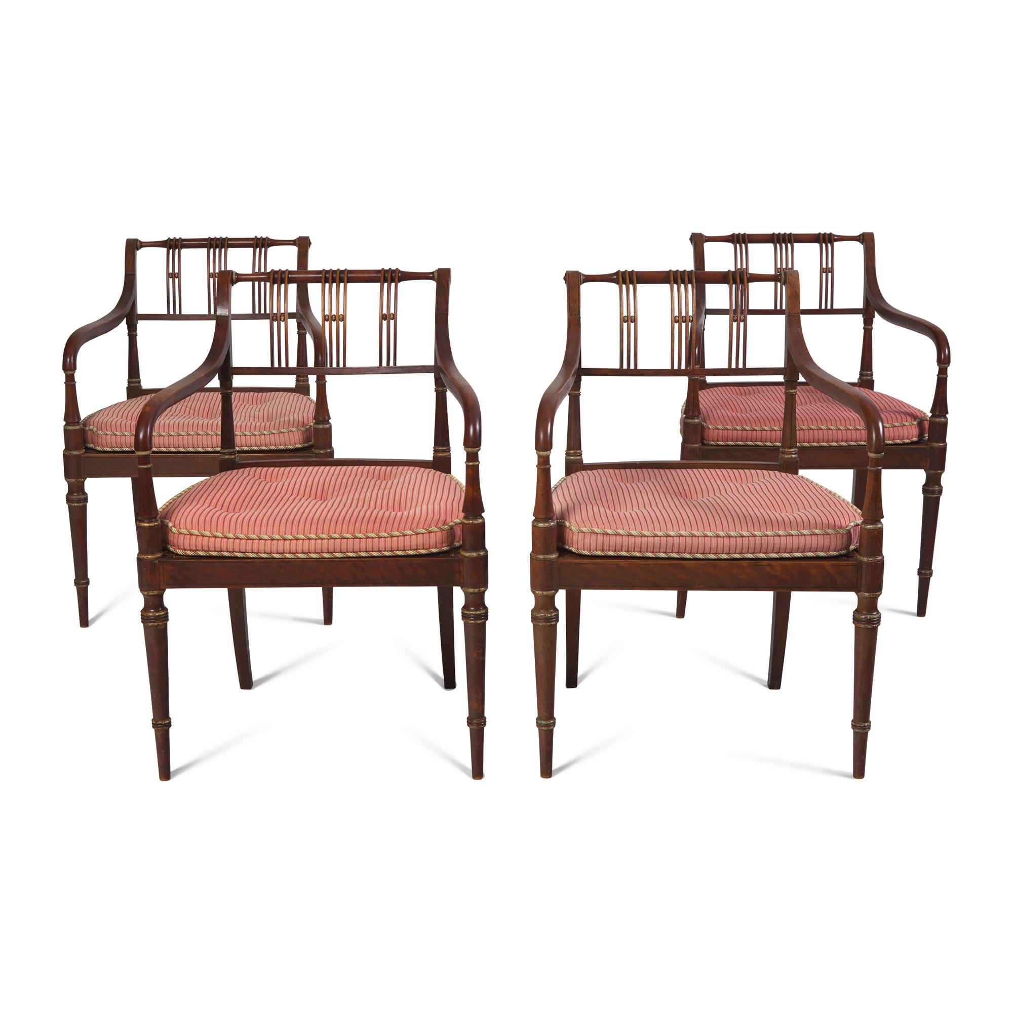 A Set of Four Regency Style Paint-Decorated Fruitwood Open Armchairs