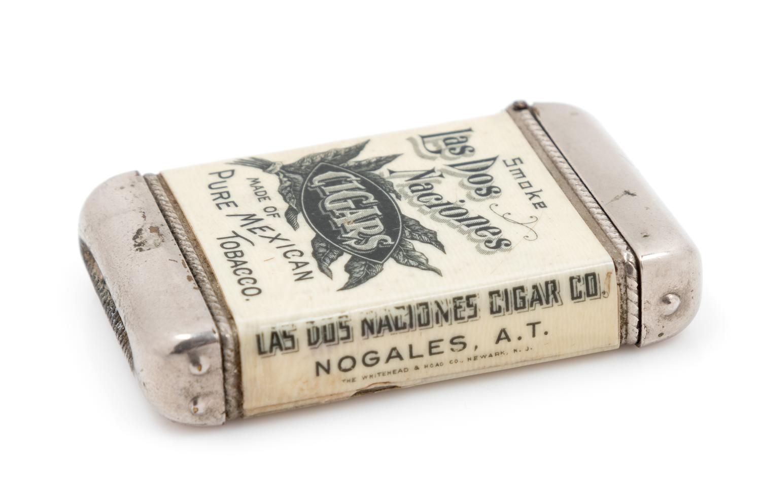A Rare Arizona Territory Celluloid and Mixed Metal Advertisement Match Safe Height 2 1/4 inches. — LAS DOS NACIONES CIGAR CO., NOGALES, SECOND HALF 19TH CENTURY