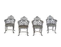 A Set of Three Victorian Style Cast Iron Garden Tables with Twelve Chairs