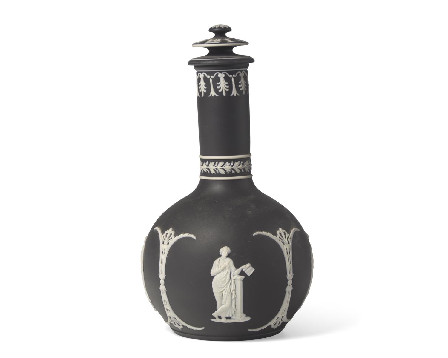 A Wedgwood Black Jasperware Bottle Vase and Cover