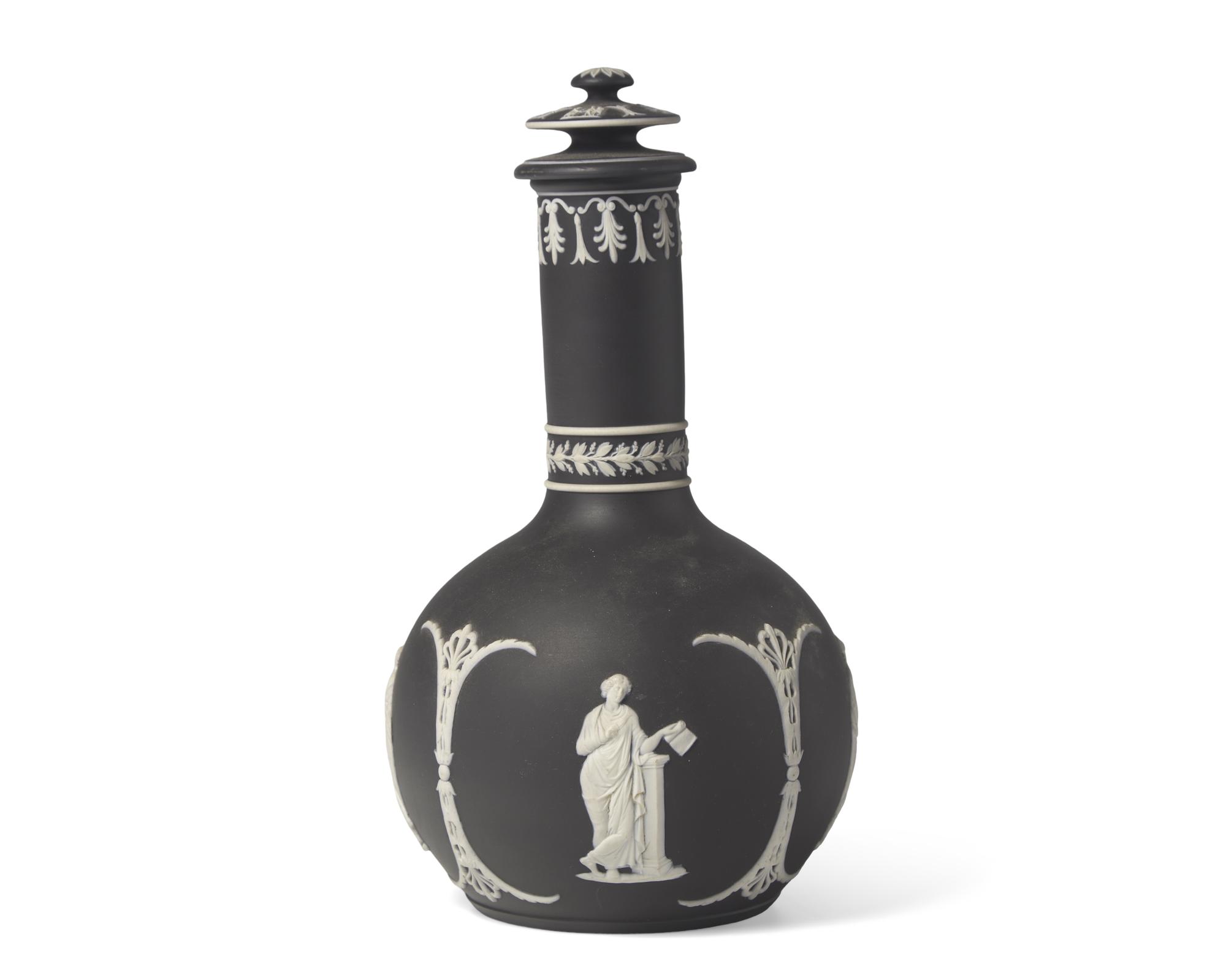 A Wedgwood Black Jasperware Bottle Vase and Cover