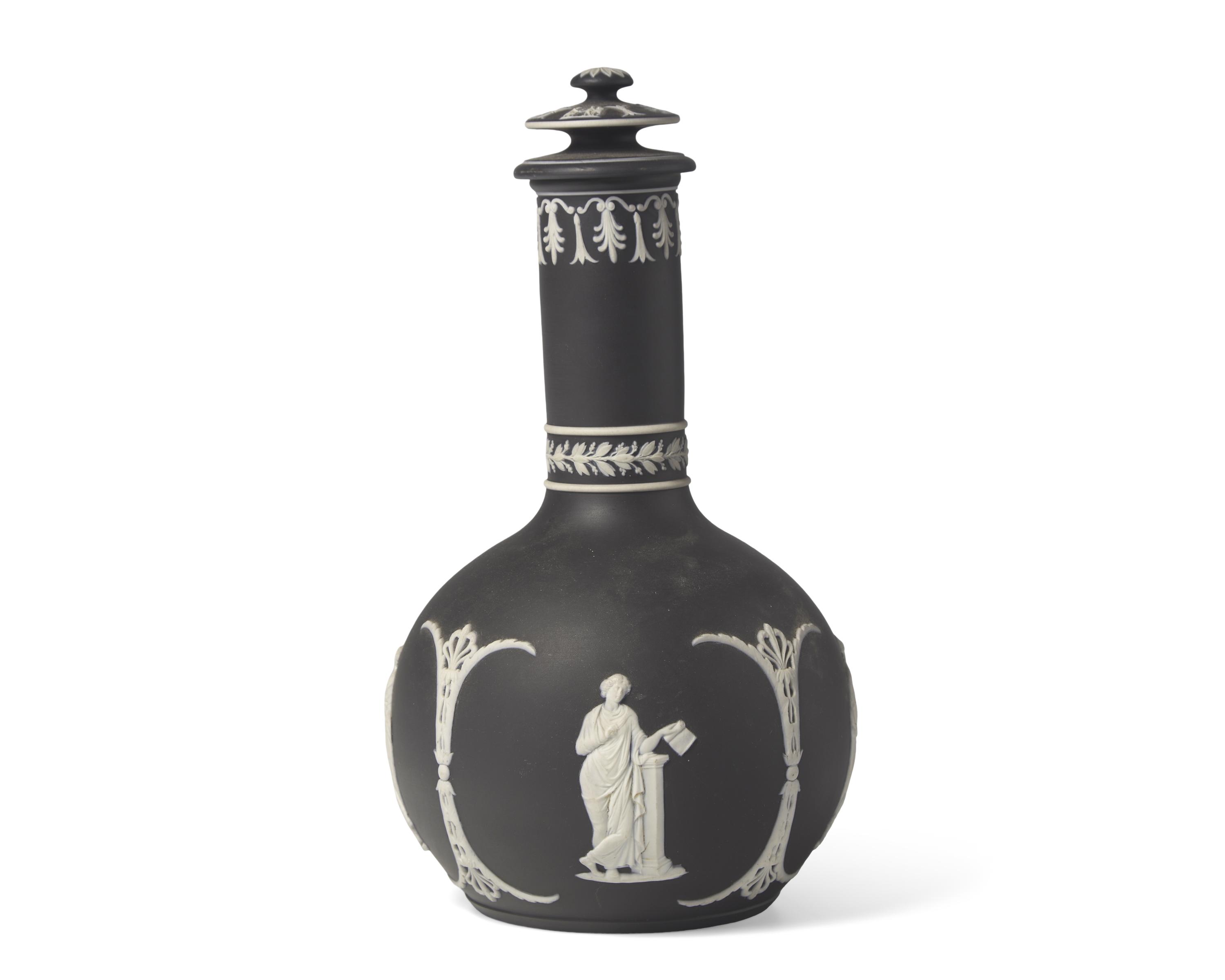 A Wedgwood Black Jasperware Bottle Vase and Cover