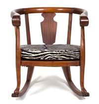A British Colonial Mahogany Loveseat and Barrel-Back Rocking Chair Height of loveseat 32 x width 45 x depth 23 inches. — 20TH CENTURY