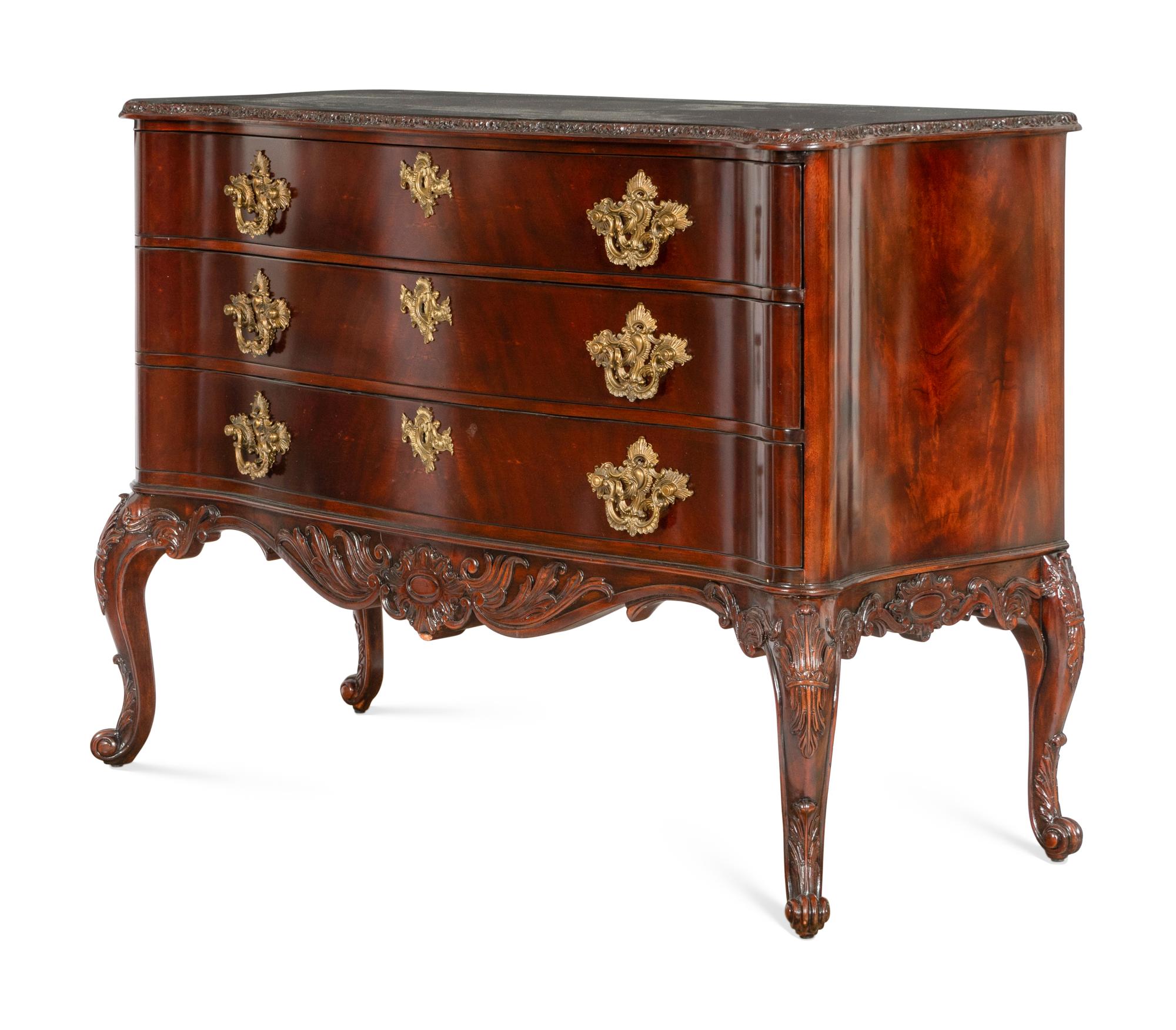 A Pair of Ralph Lauren Heiress Carved Mahogany Commodes