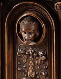 A Renaissance Revival Carved Walnut Marble-Top Cabinet