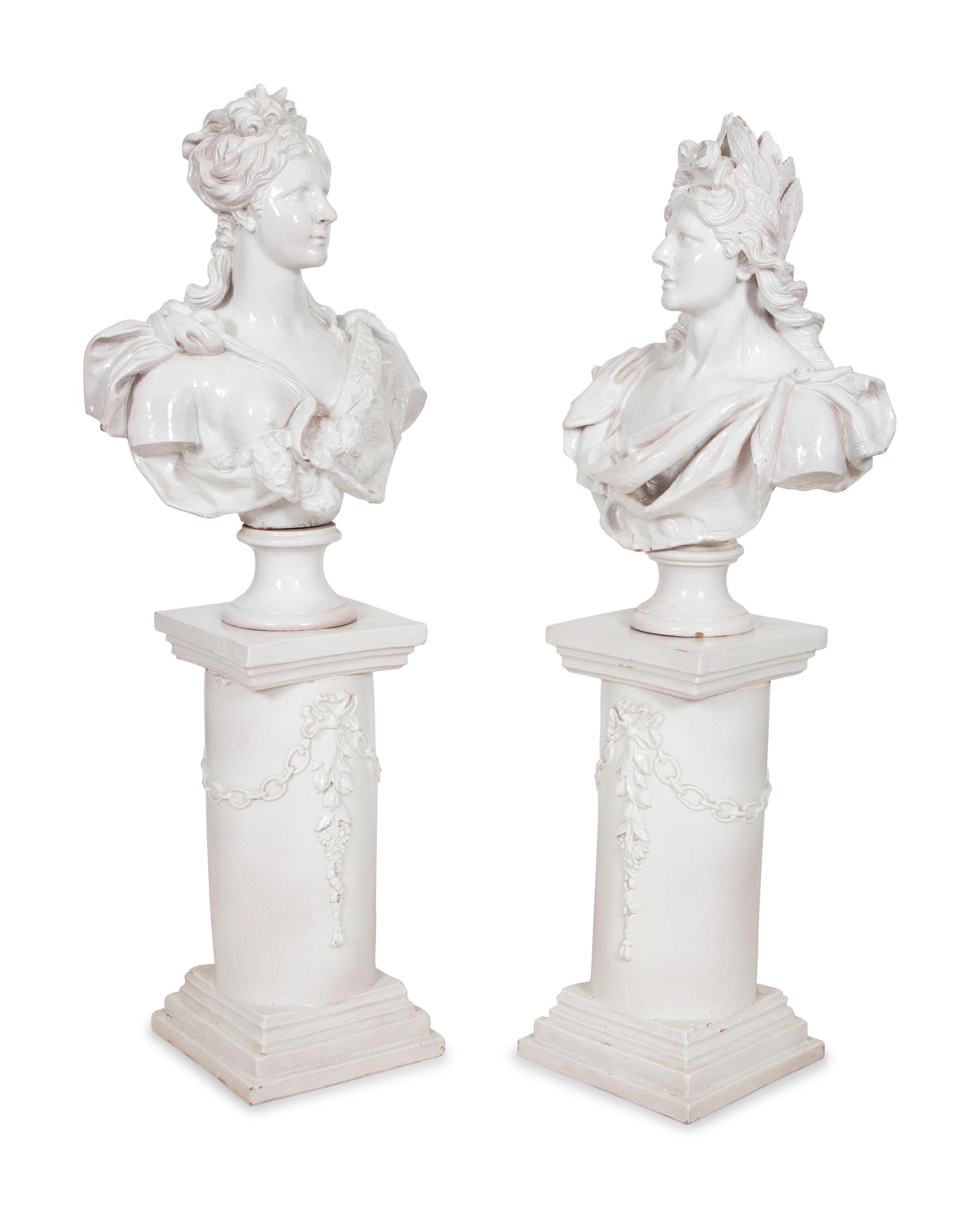A Pair of Italian Glazed Terracotta Portrait Busts on Neoclassical Style Pedestals