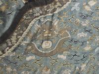 A Chinese Blue Ground Kesi Silk Dragon Robe, Jifu, 19th Century 清晚期 藍地緙絲云龍紋吉服