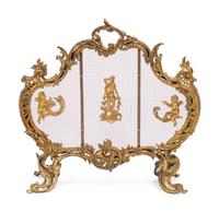 A Louis XV Style Gilt Bronze Four-Piece Fireplace Set