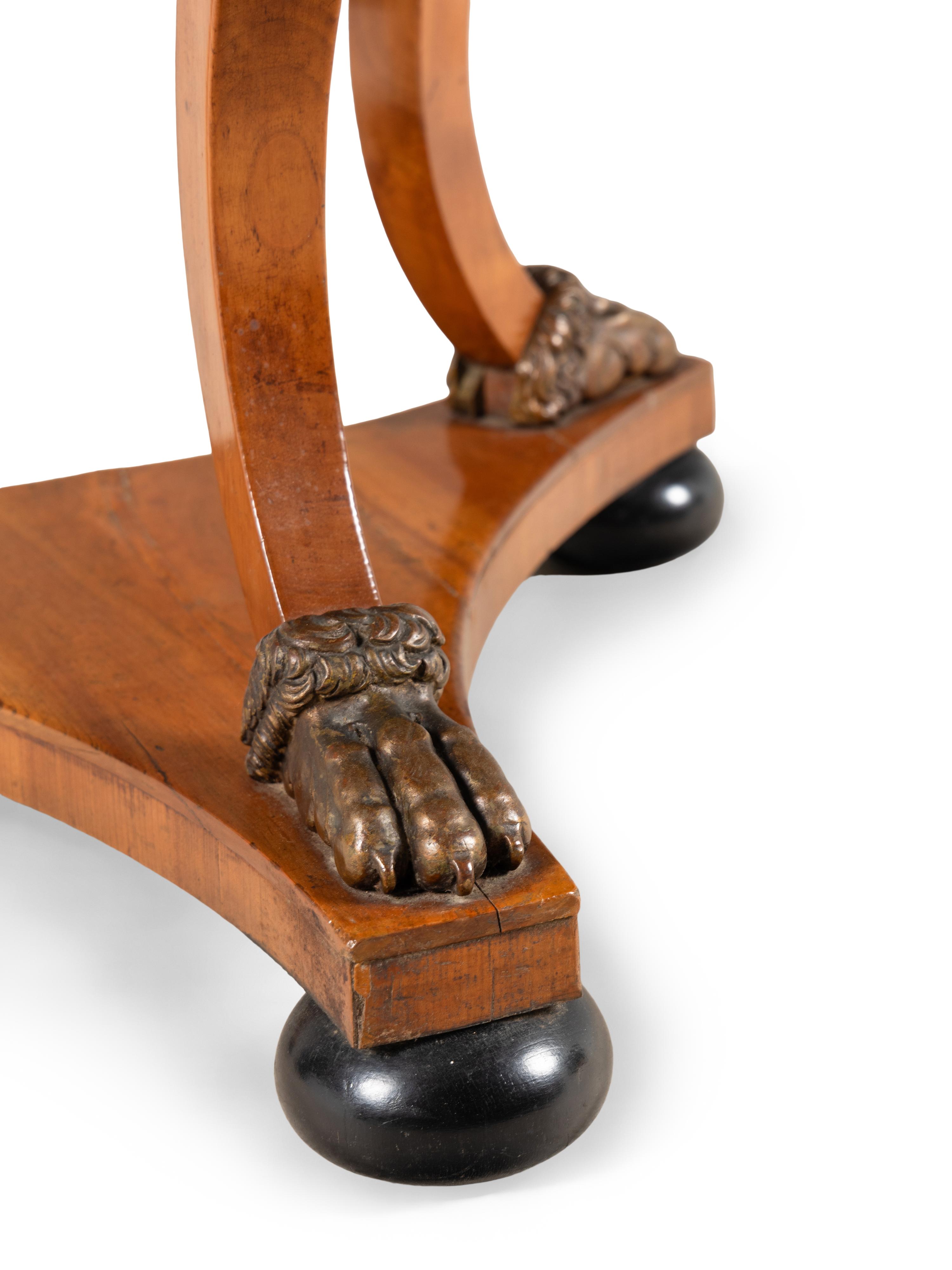 A Continental Parcel Ebonized Birch Marble-Top Center Table
