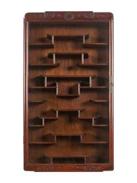 A Pair of Chinese Carved Hardwood Vitrine Cabinets
