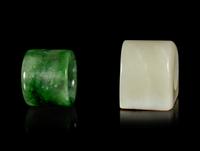 Two Chinese Jade and Hardstone Archer's Rings