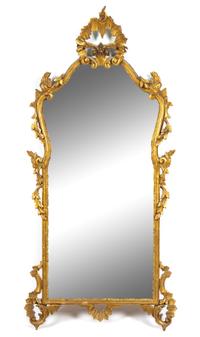An Italian Baroque Style Giltwood Mirror