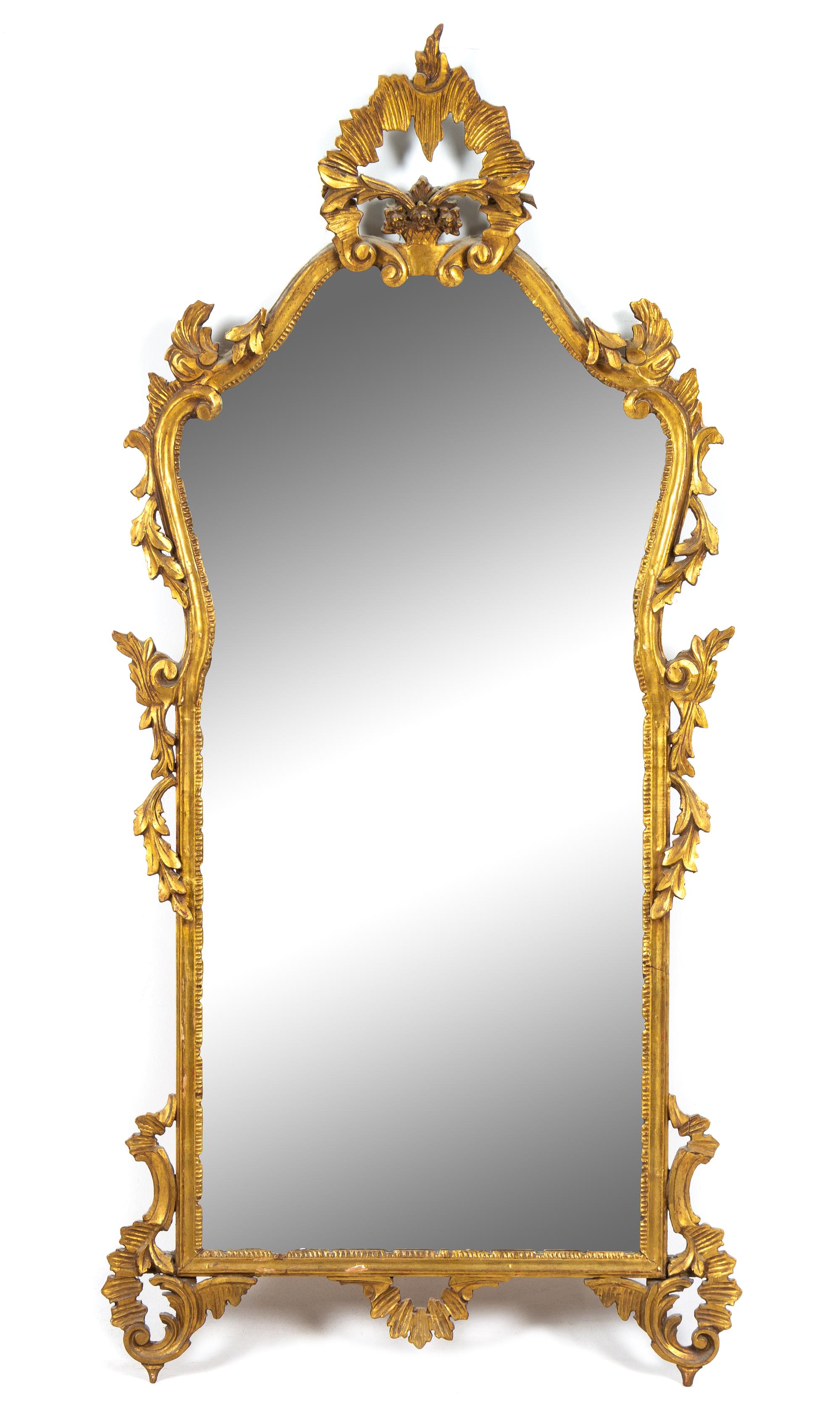 An Italian Baroque Style Giltwood Mirror