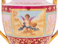 A Pair of Vienna Painted Porcelain Covered Urns and Stands