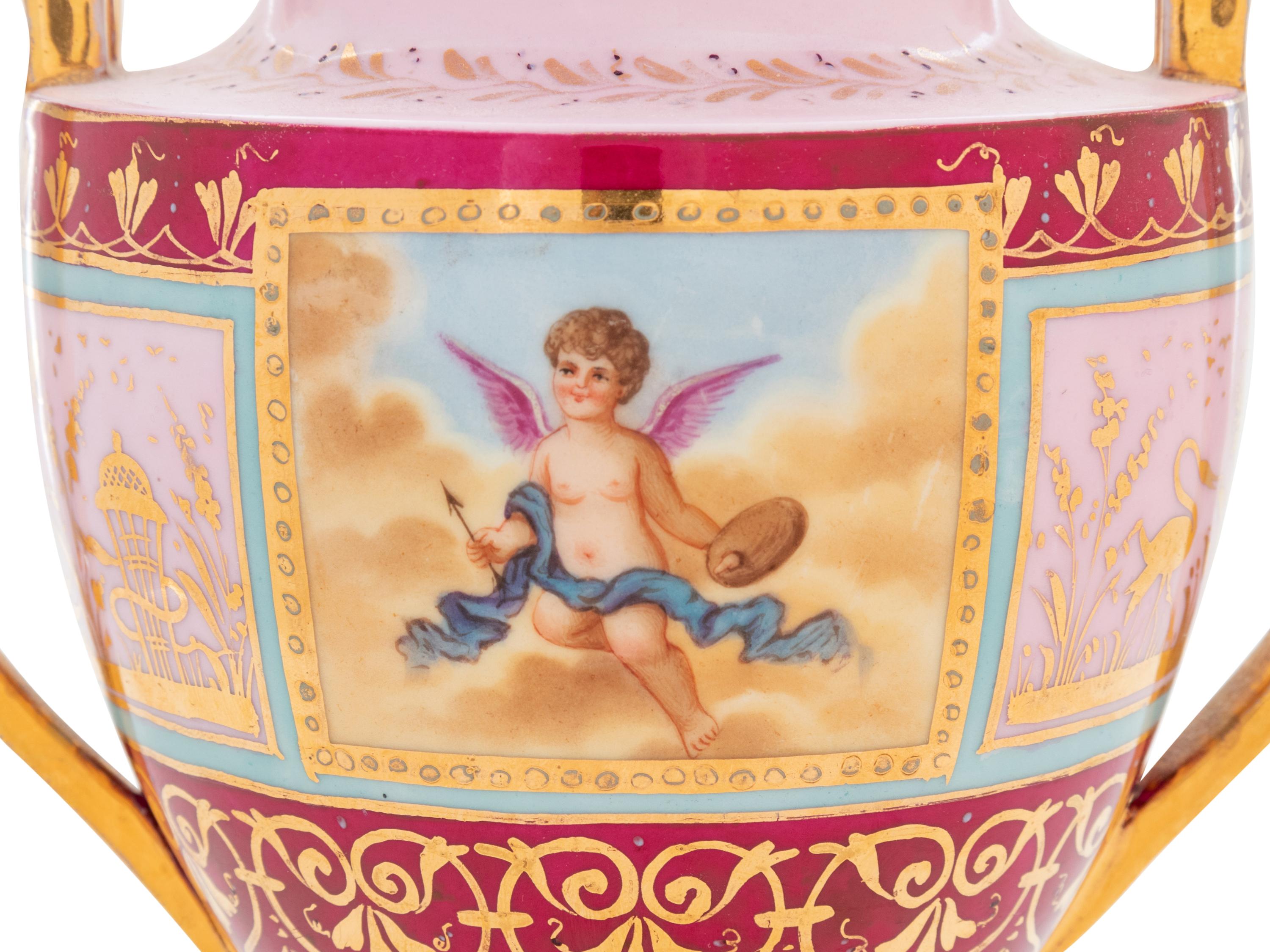 A Pair of Vienna Painted Porcelain Covered Urns and Stands