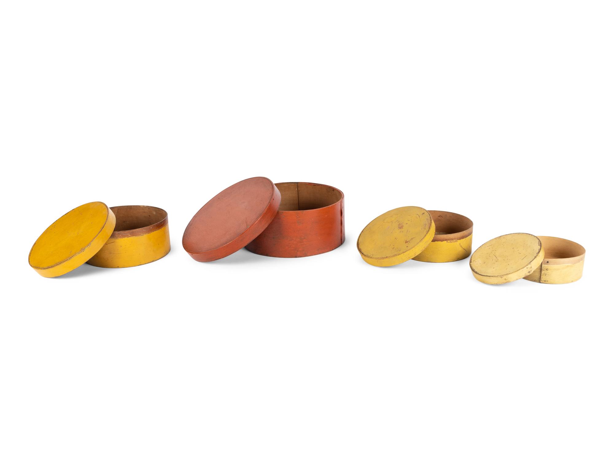 A Set of Four Graduated Shaker Boxes