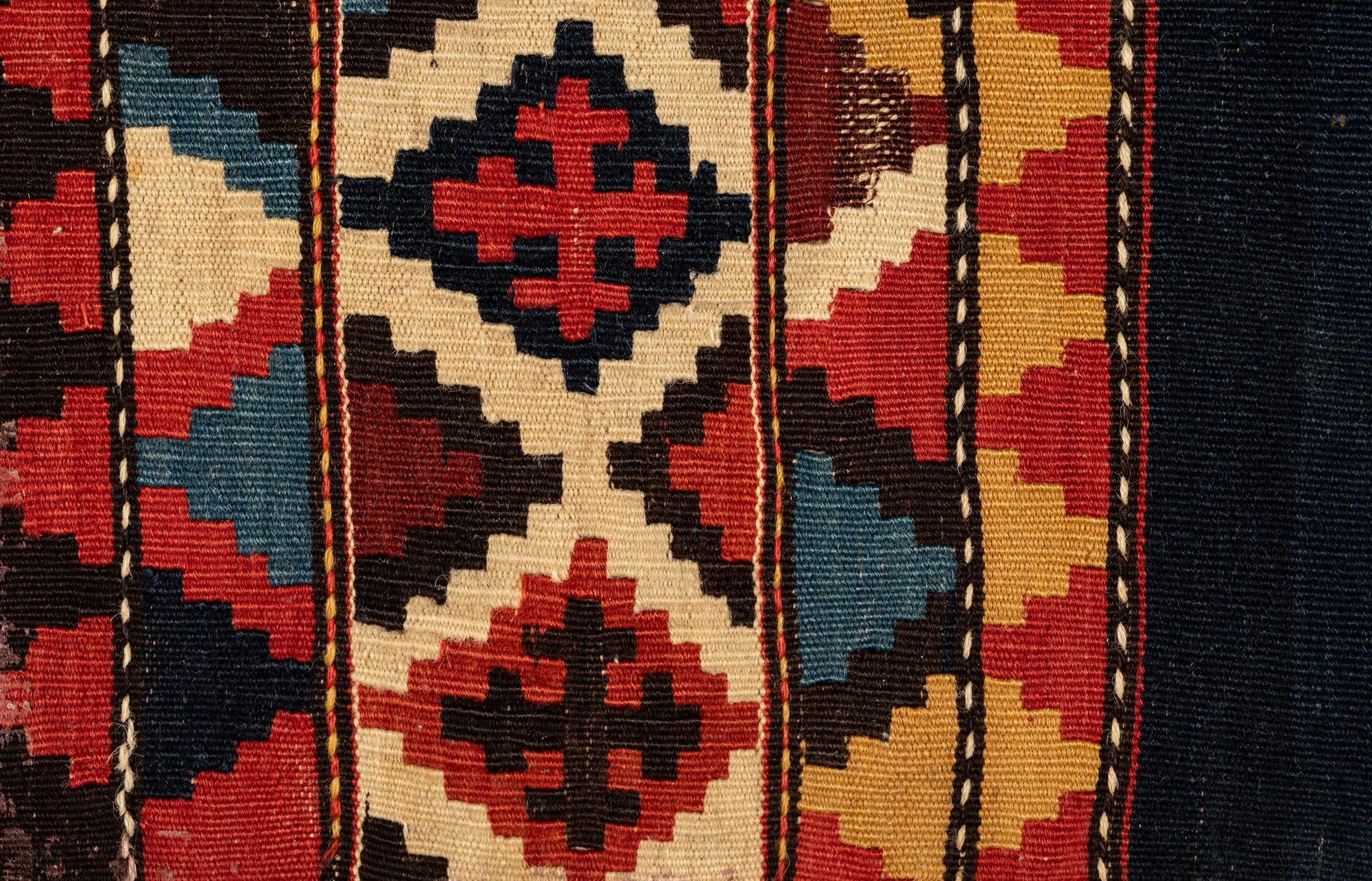 A Group of Three Kilim Rugs