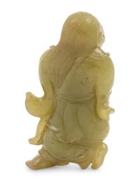 A Chinese Green Jade Figure of an Immortal