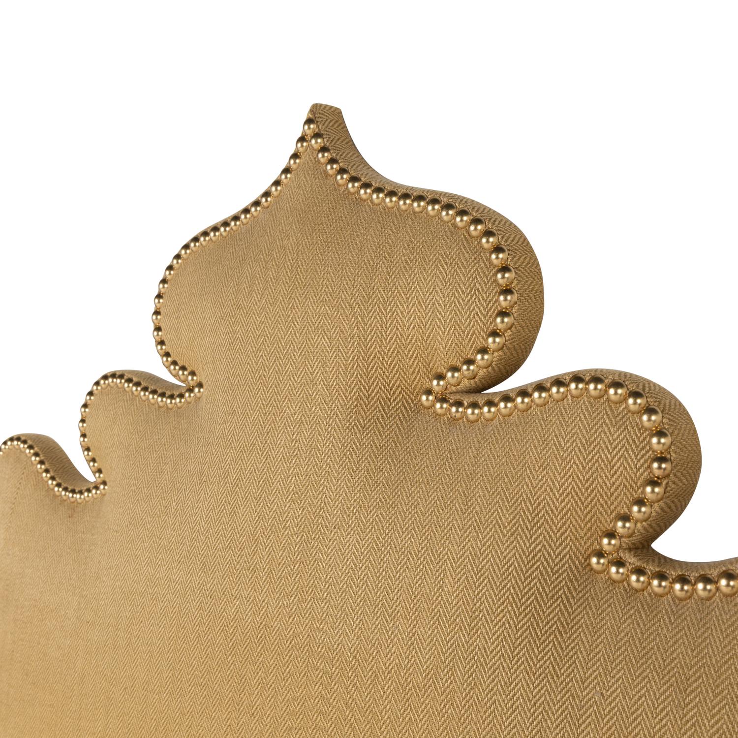 A Custom Upholstered and Studded Headboard