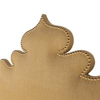 A Custom Upholstered and Studded Headboard