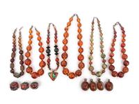 A Group of Six Beaded Necklaces and Seven Pendants