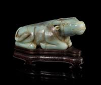 A Celadon Jade Figure of a Water Buffalo Length 14 1/4 inches.