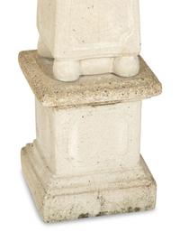 A Set of Four Cast Stone Obelisks
