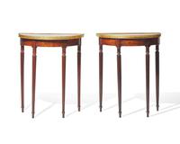 A pair of George III parcel-gilt mahogany demilune console tables with inset tops, circa 1810 and later