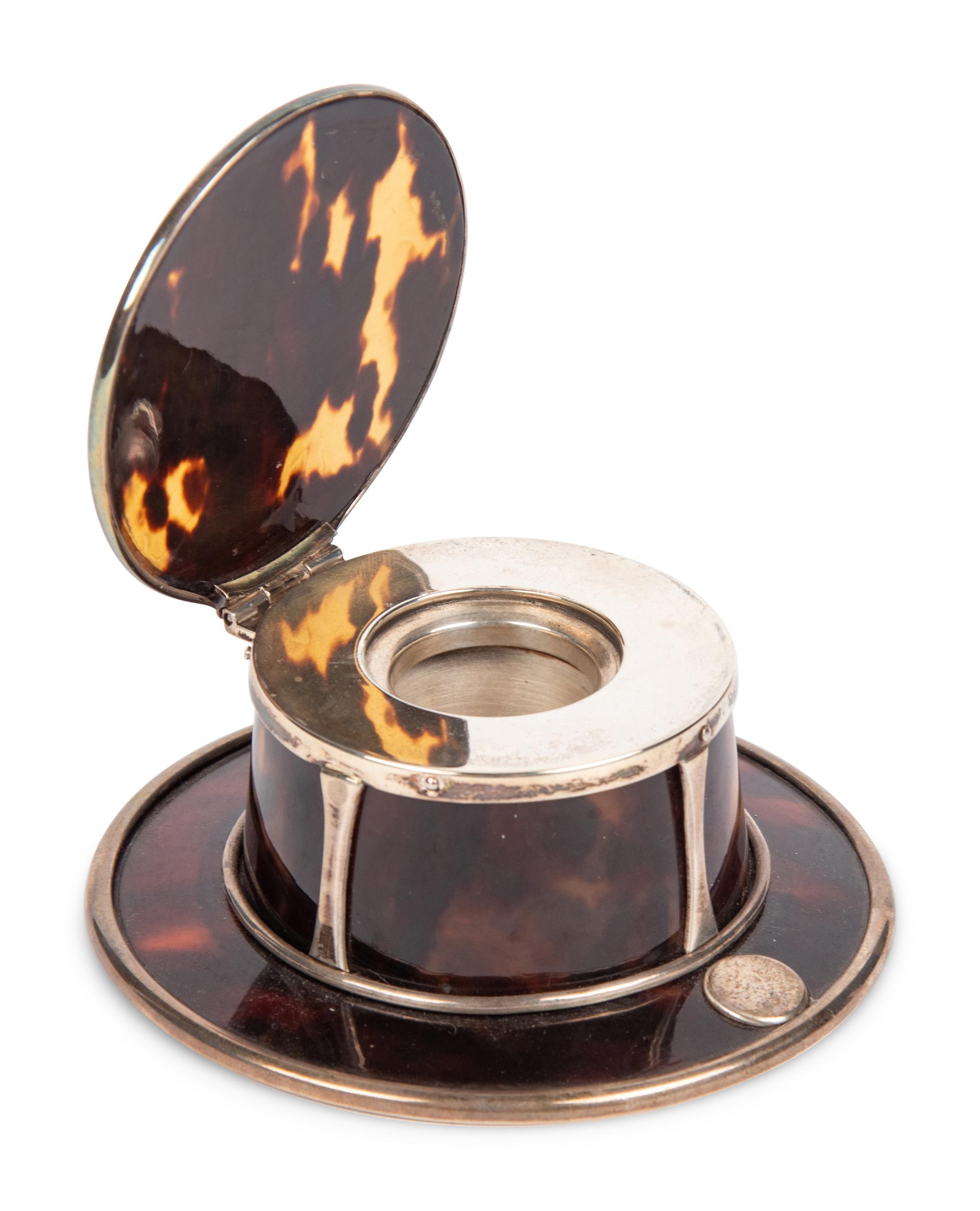 An English Arts and Crafts Silver and Tortoiseshell Inkwell