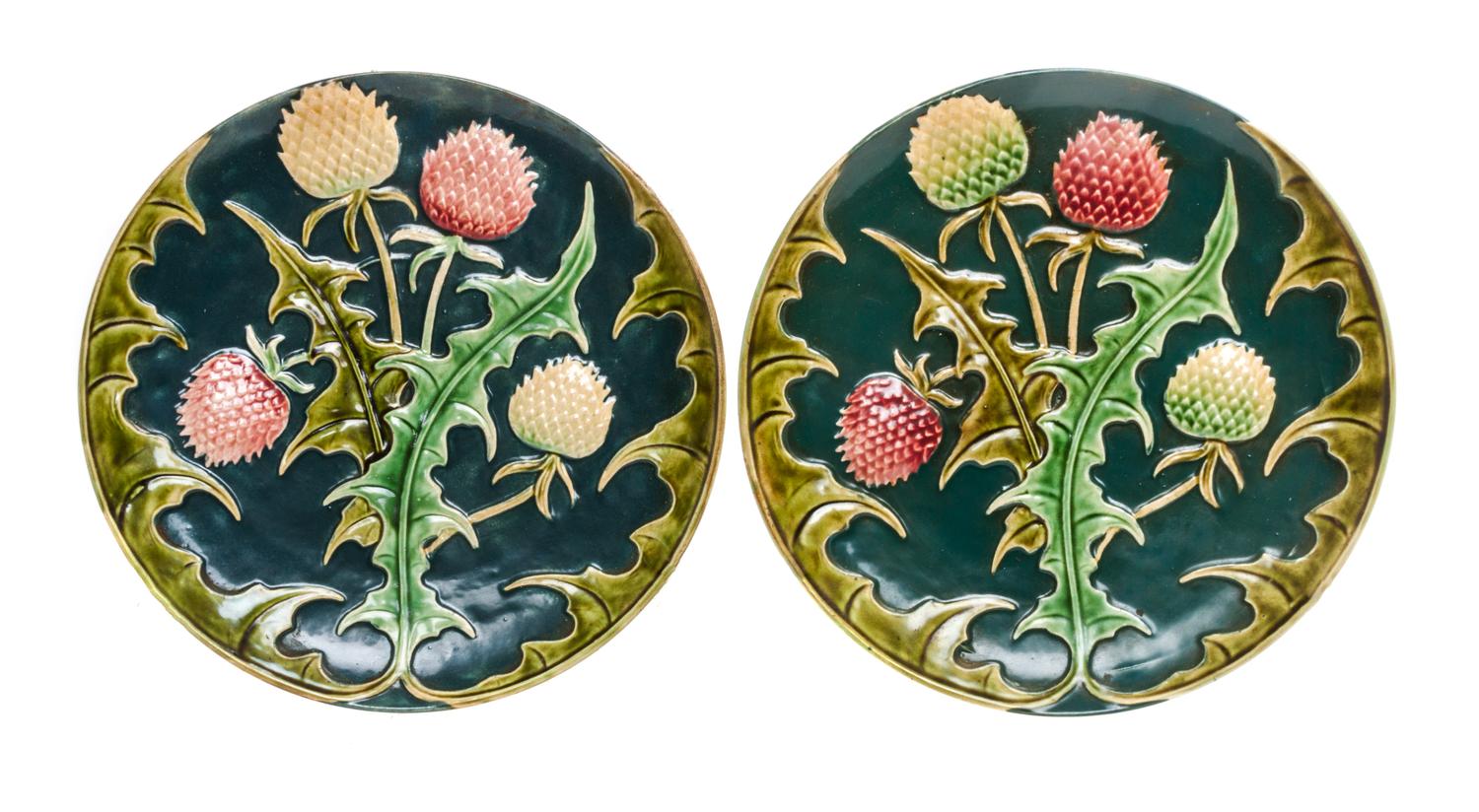 A Pair of Art Nouveau Faience Chargers Diameter 12 1/2 inches.