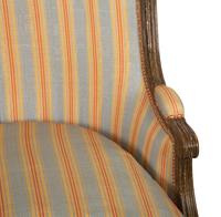 A Pair of Louis XVI Style Faux Finish Bergeres