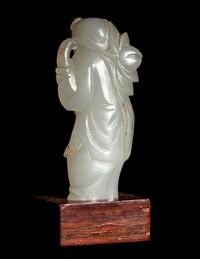 Two Carved Pale Celadon Jade Figures