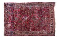 A Sarouk Wool Rug 11 feet 8 inches x 8 feet 6 inches.