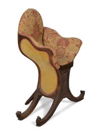 A Venetian Carved Walnut Gondola Chair