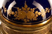 A Pair of Gilt Bronze Mounted Sèvres Style Porcelain Urns